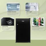 Haier 100 L 2 Star Direct Cool Single Door Mini Bar Refrigerator with Chiller Freezer Box, LED Light for Clear View, Lock & Key and Easy Clean Back (HRD-1252KSA, Black Steel, )